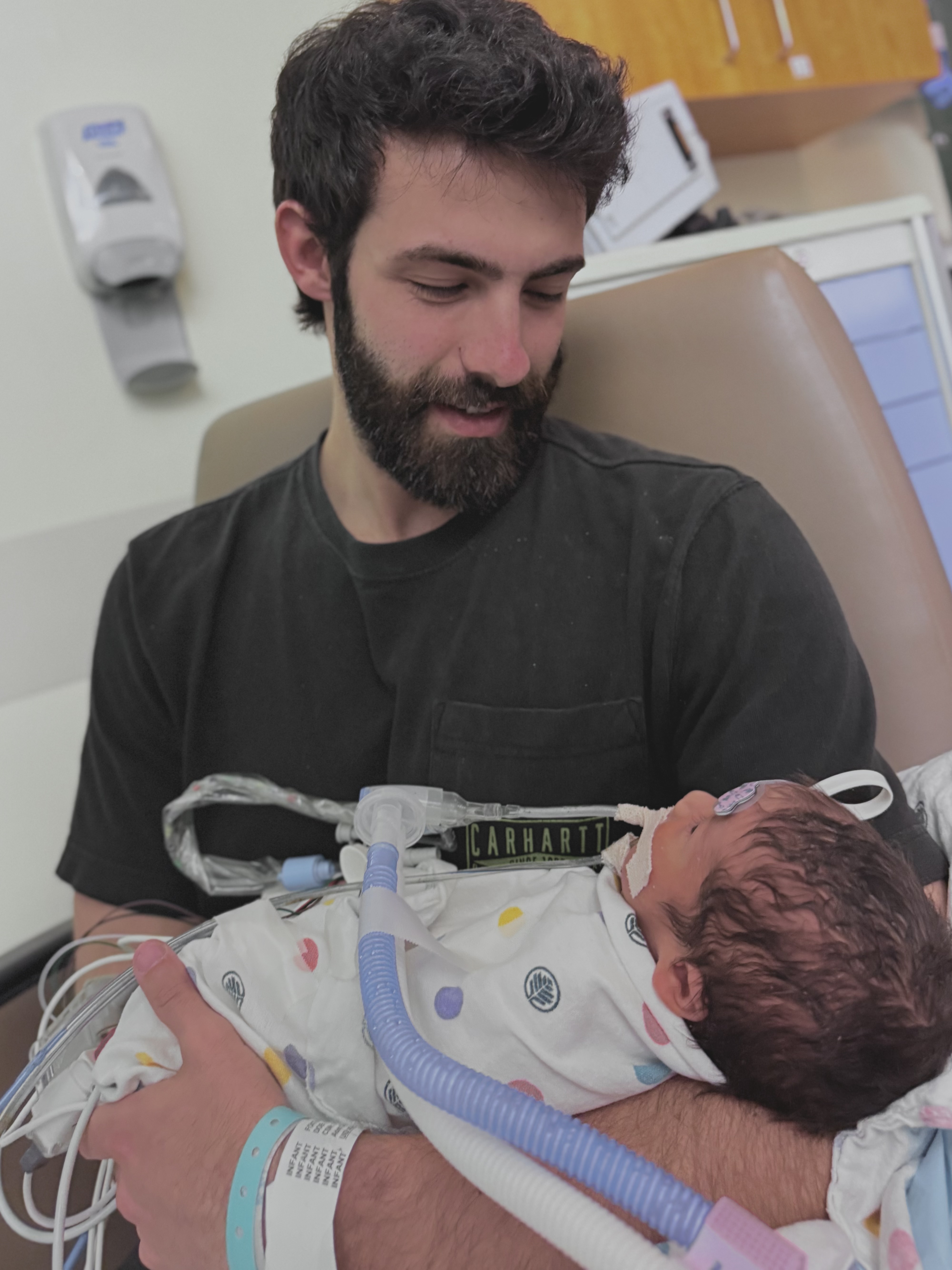 Caleb holding Samuel