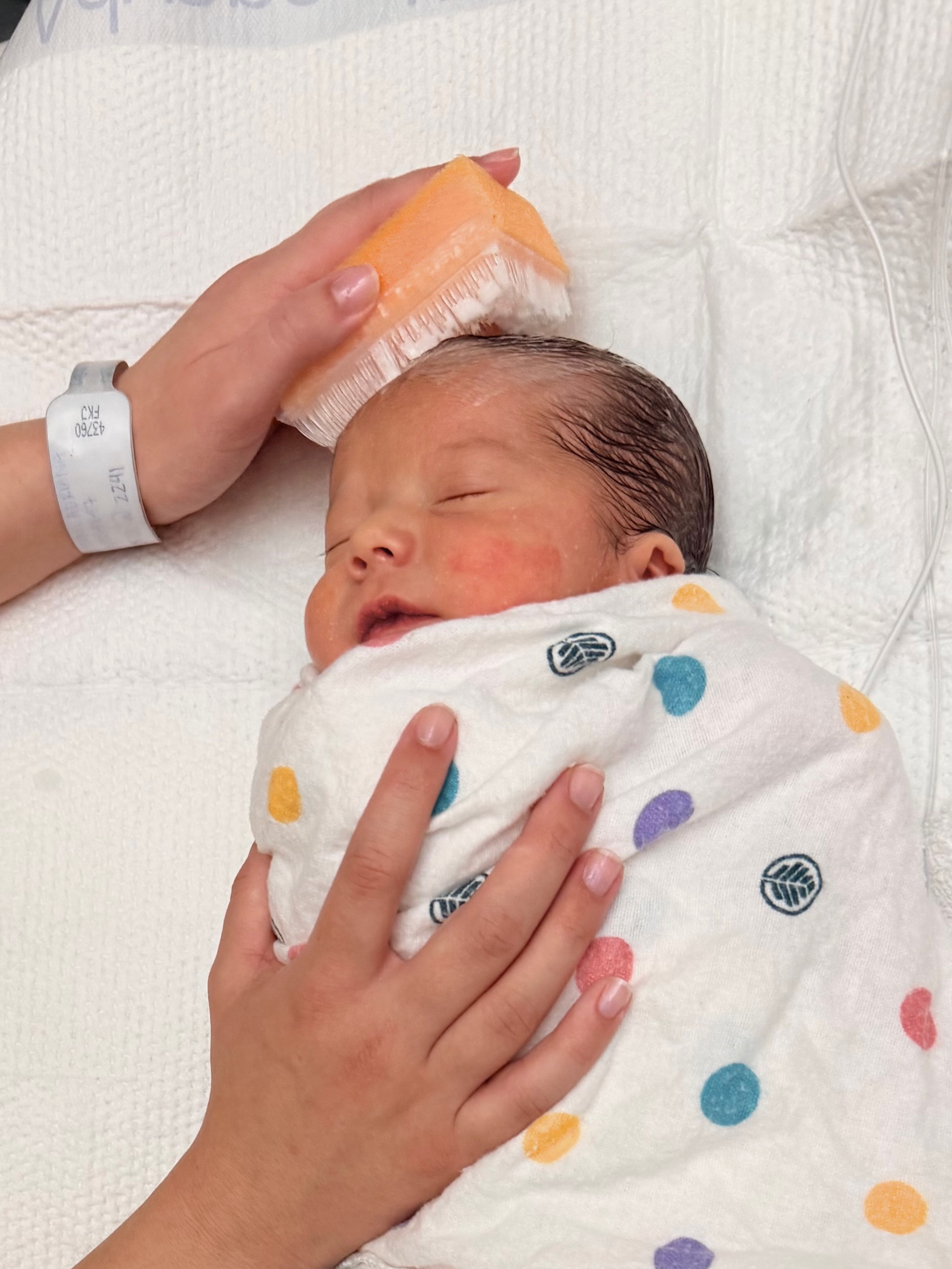 Samuel breathing on his own